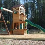 Playground border using wooden landscape timbers with wood chips