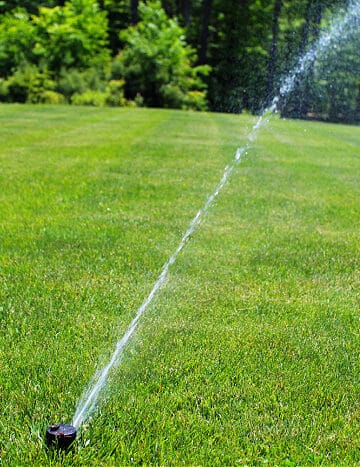 sprinkler watering lawn